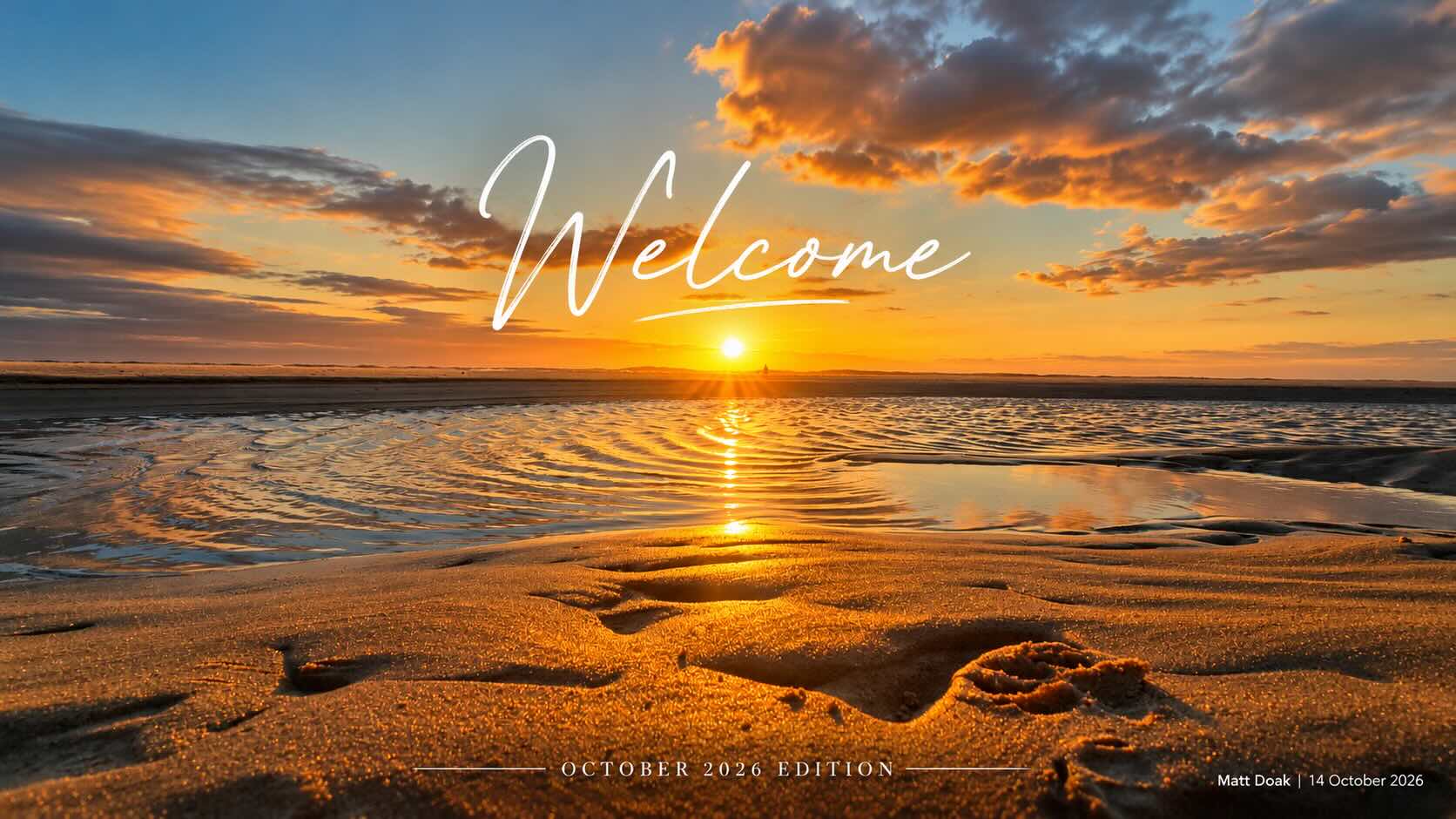 Welcome to The Villager — October 2026 Edition. Golden sunset at Main Beach, photographed by Matt Doak.